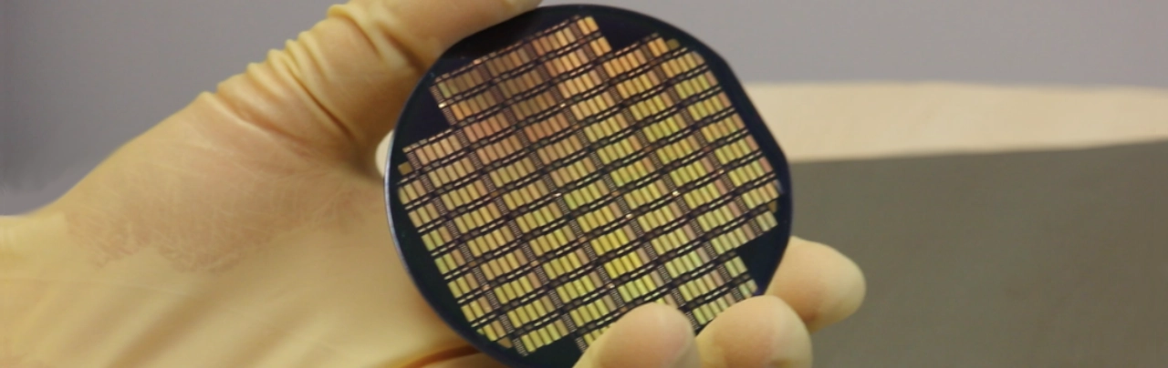 A processed wafer in a hand
